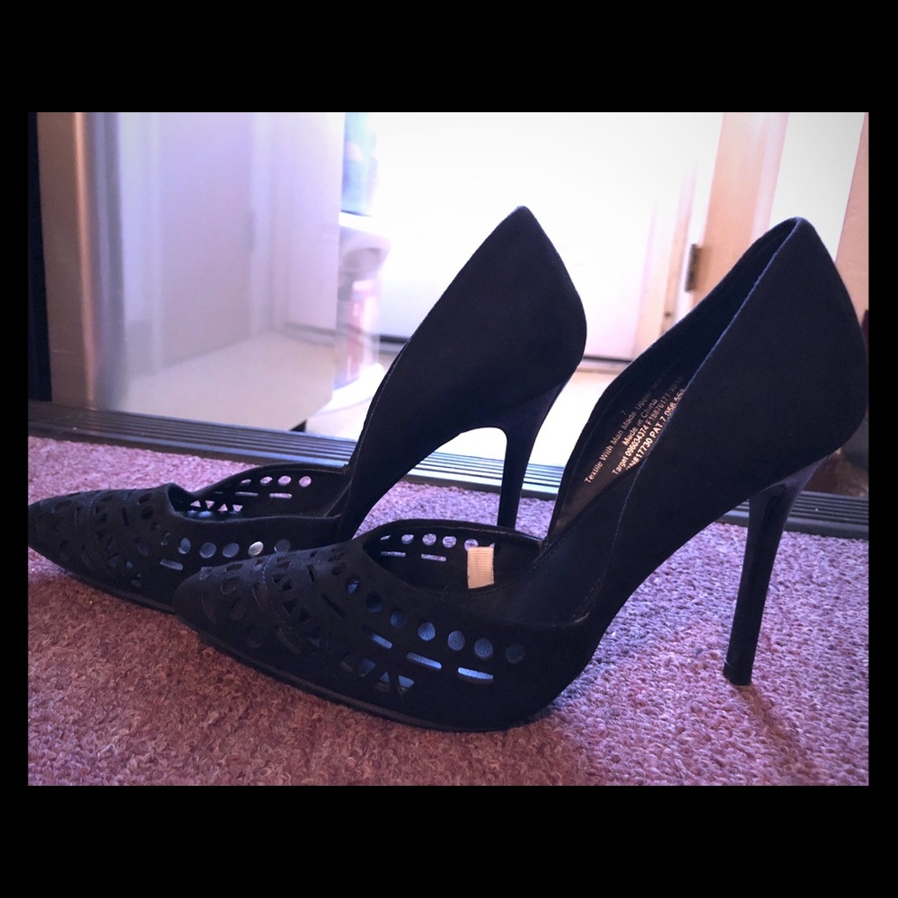 Black stilettos with holed pattern
